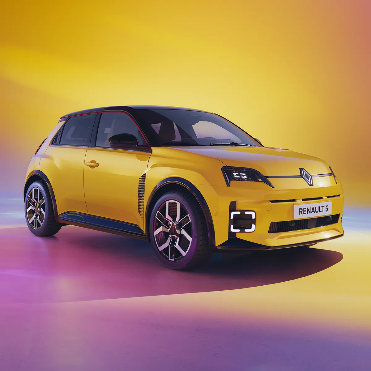 Renault 5 E-Tech eléctrico amarillo vista frontal lateral - coche eléctrico compacto urbano 2026